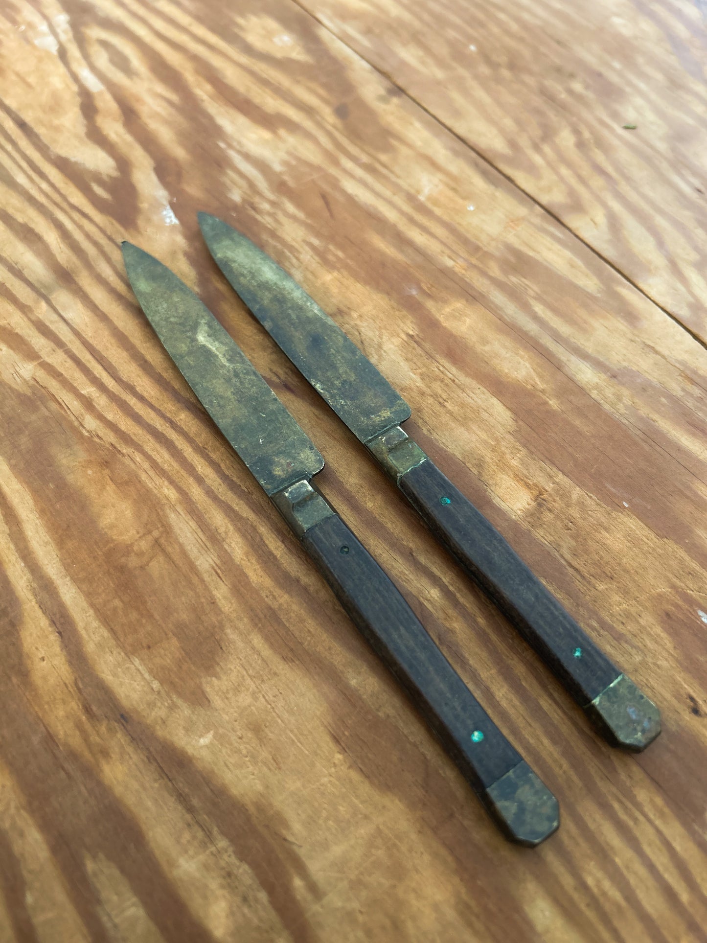 Early 20th Century knives, dark wood